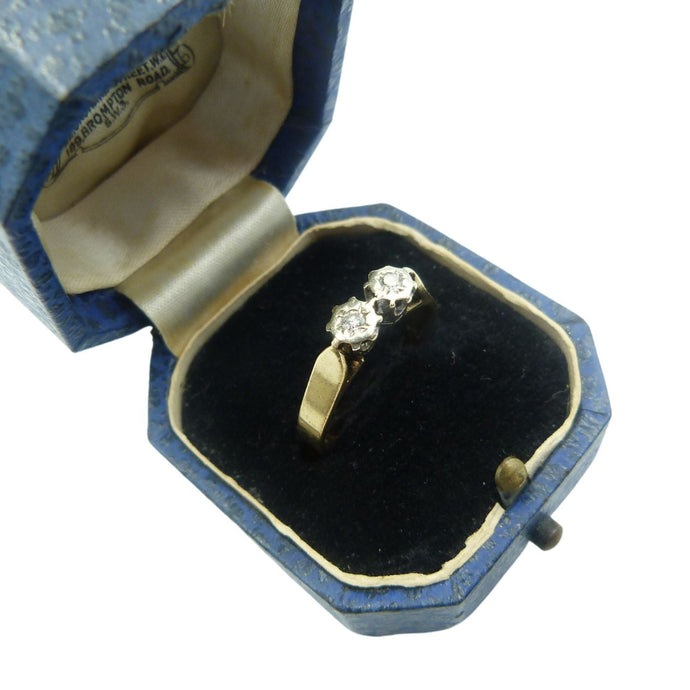 A beautiful vintage mid century solid 9ct gold ring set with two small diamonds in a stylish double crown setting.   The ring is fully hallmarked for Birmingham, with the makers mark H.W.T and the date letter 'E' for 1979  The diamonds measure 2 mm in diameter and the ring weighs 2.5g.  UK ring size N ~ US ring size 6.5  