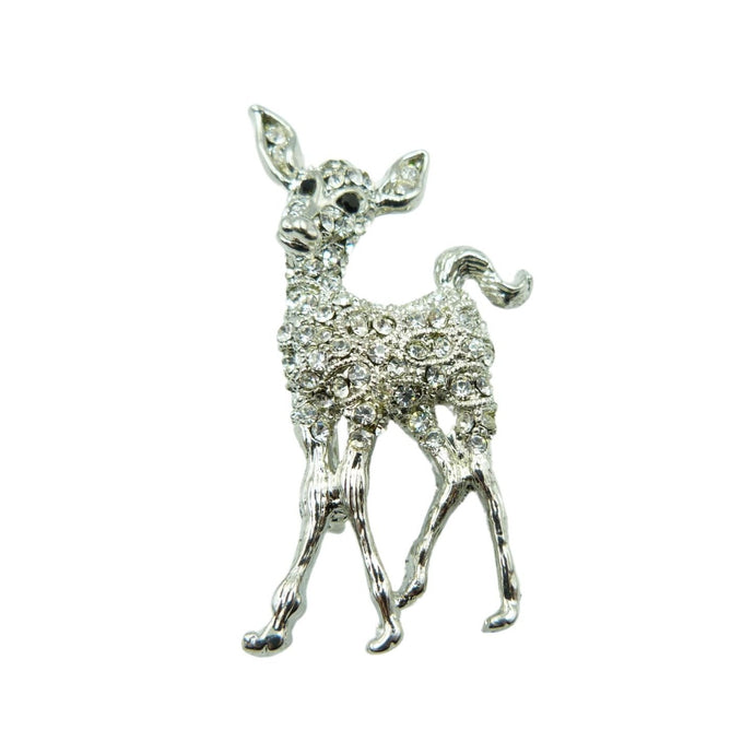 A pretty vintage brooch made of silver white metal set with crystal clear rhinestones in a cute deer design. 